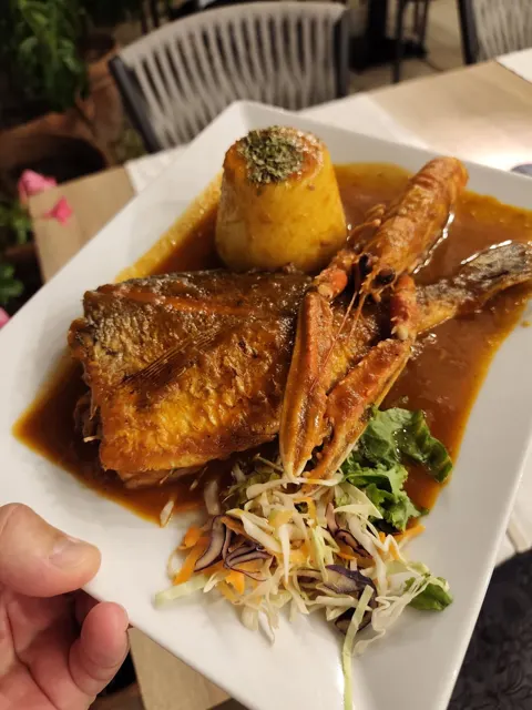 Signature fish dish with prawns and polenta