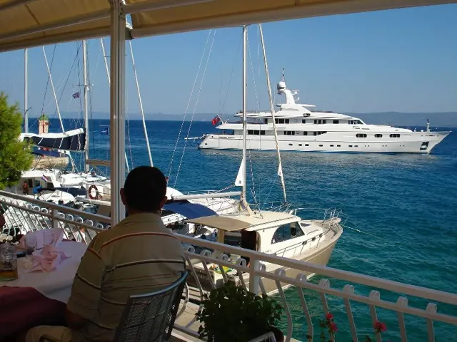Yacht anchored in the harbour seen from the terrace
